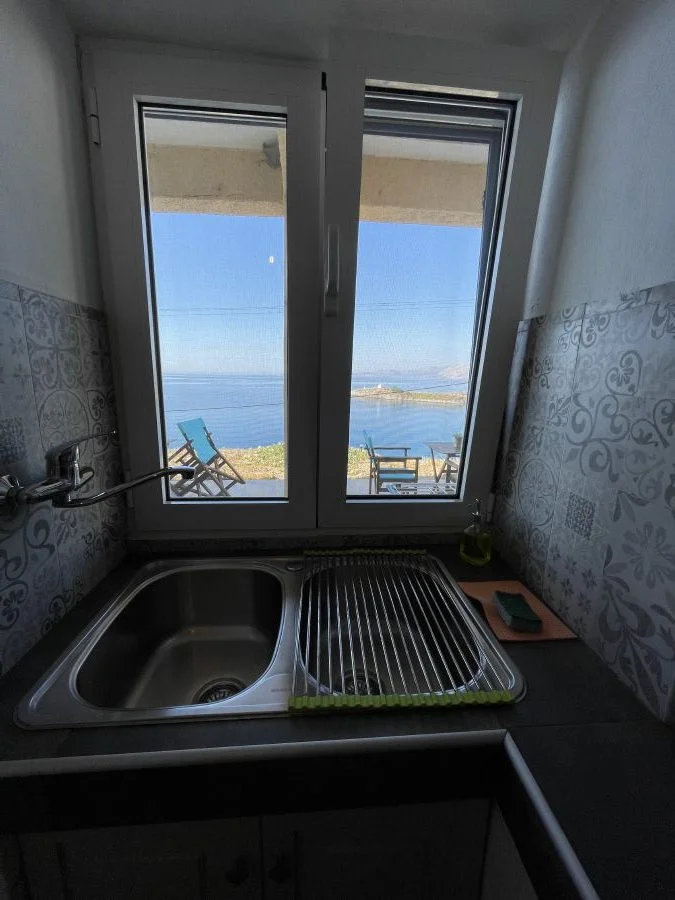 ROOMS TO RENT IN OINOUSSES by OINOUSSES-ROOMS.GR